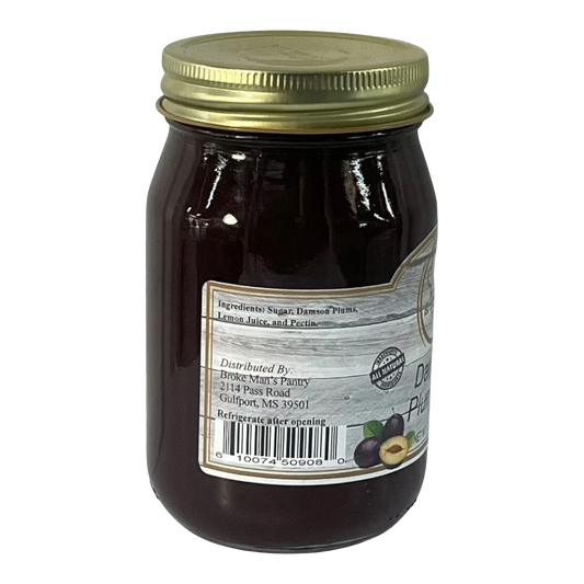 Broke Man's Pantry Damson Plum Jam in a glass jar with a gold lid, featuring all-natural ingredients.