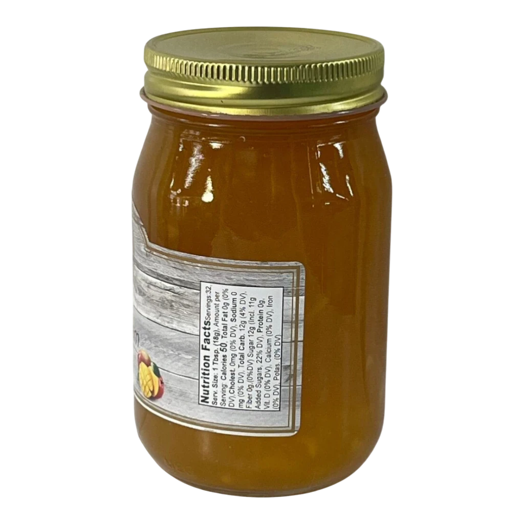 Broke Man's Pantry all-natural mango jam in a glass jar with a gold lid and rustic nutrition label.