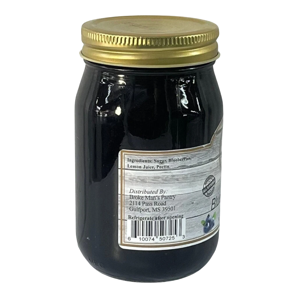 Broke Man's Pantry Blueberry Jam in a glass jar with a gold lid. All-natural ingredients.