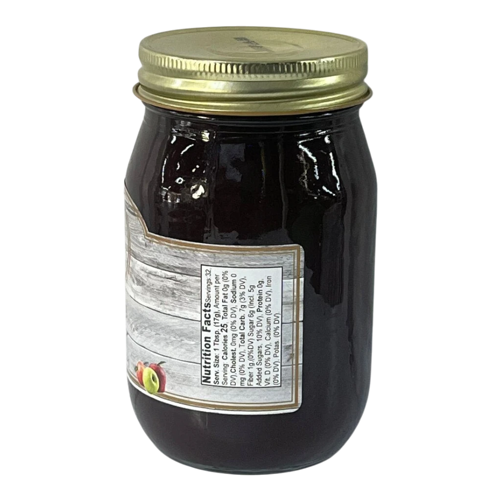Broke Man's Pantry all-natural apple butter in a glass jar with a gold lid and rustic nutrition label.