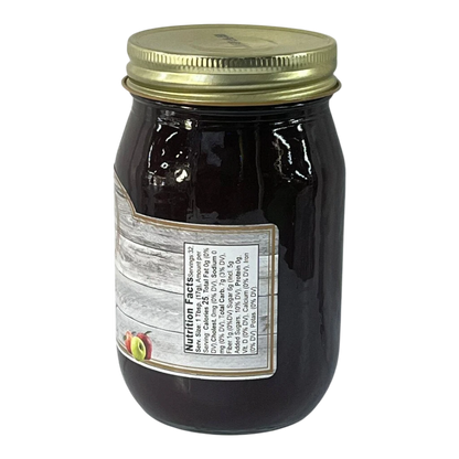 Broke Man's Pantry all-natural apple butter in a glass jar with a gold lid and rustic nutrition label.