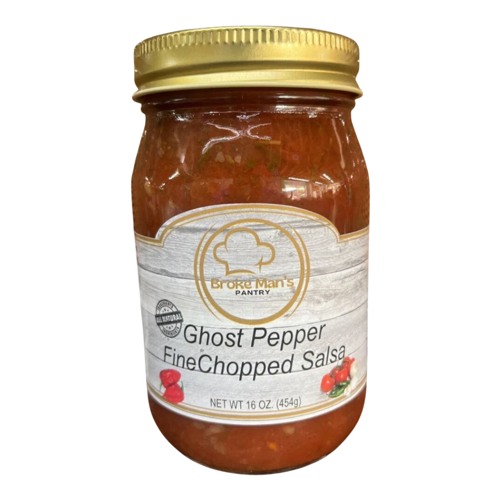 Broke Man's Pantry Ghost Pepper Fine Chopped Salsa in a 16 oz glass jar with a gold lid on a wooden surface.