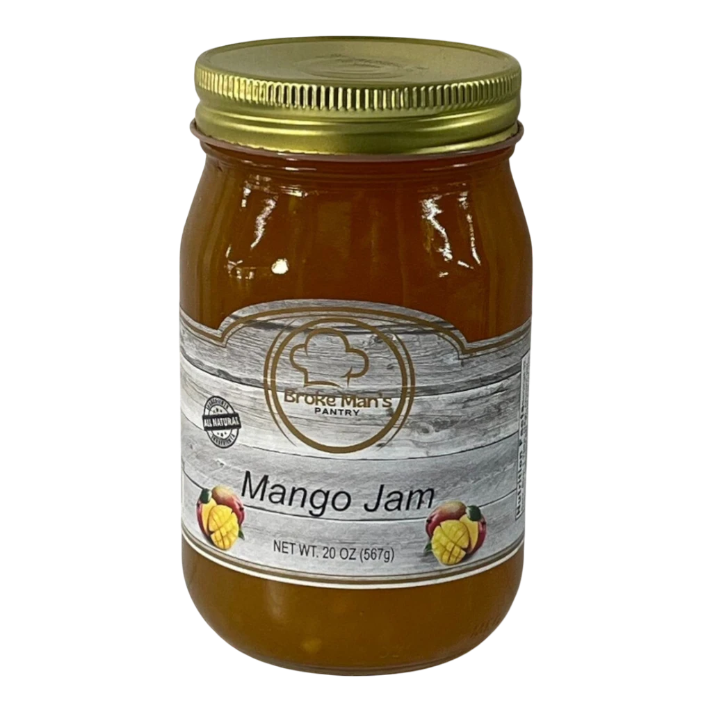 Broke Man's Pantry all-natural mango jam in a 20 oz glass jar with a gold lid and rustic wood-grain label.