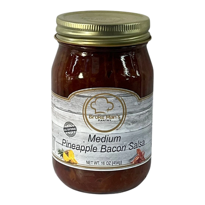 Broke Man's Pantry Medium Pineapple Bacon Salsa in a 16 oz glass jar with a gold lid and rustic wood-grain label.