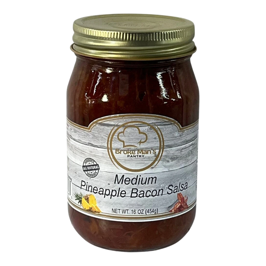 Broke Man's Pantry Medium Pineapple Bacon Salsa in a 16 oz glass jar with a gold lid and rustic wood-grain label.