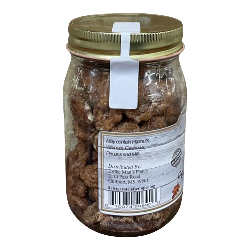 Broke Man's Pantry Praline Pecan Halves in a glass jar with a gold lid, featuring a sweet and crunchy sugar coating.