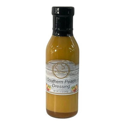 Broke Man's Pantry Southern Peach Dressing in a 12 oz glass bottle with a sweet and tangy golden peach puree blend.