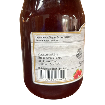 Broke Man's Pantry all-natural strawberry jam jar label showing ingredients and barcode on a black background.