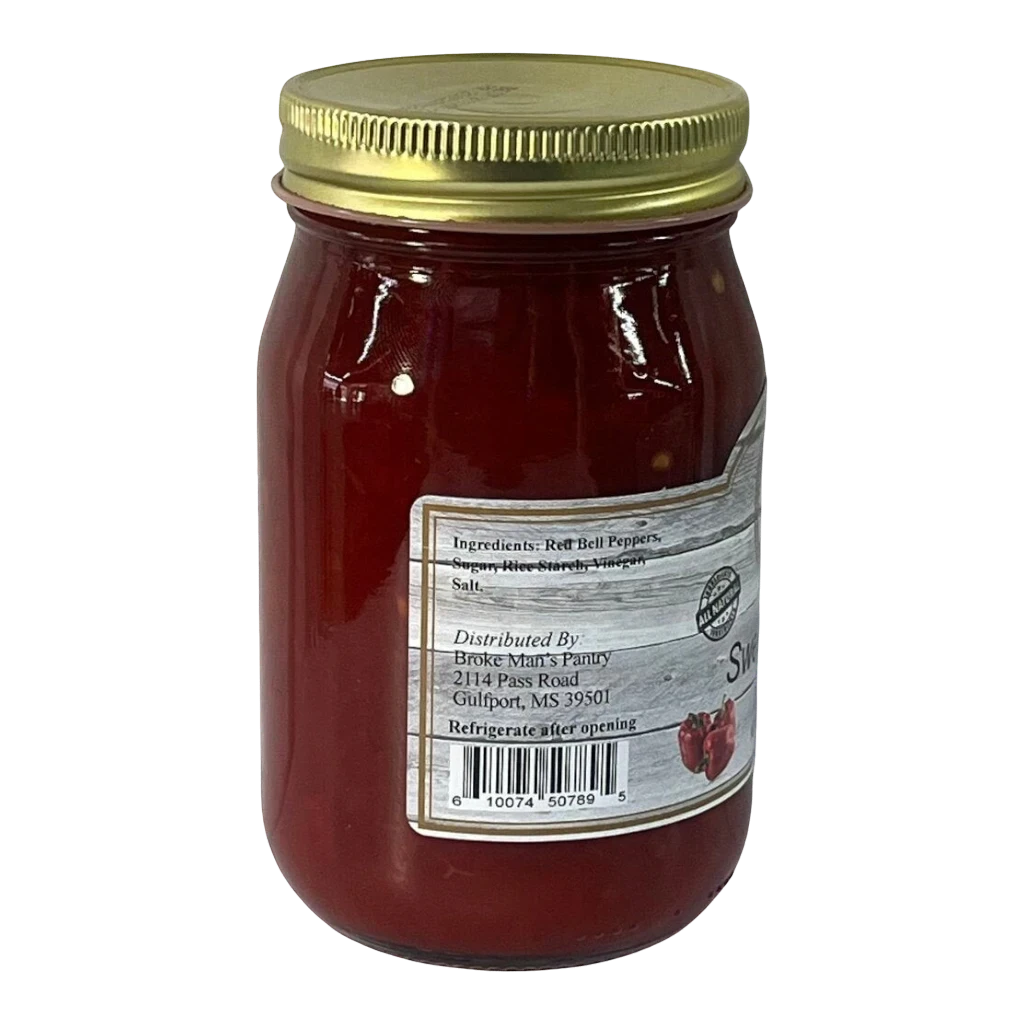 Broke Man's Pantry mild sweet pepper relish in a glass jar with a gold lid, featuring red bell pepper ingredients.