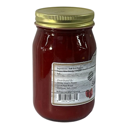 Broke Man's Pantry mild sweet pepper relish in a glass jar with a gold lid, featuring red bell pepper ingredients.
