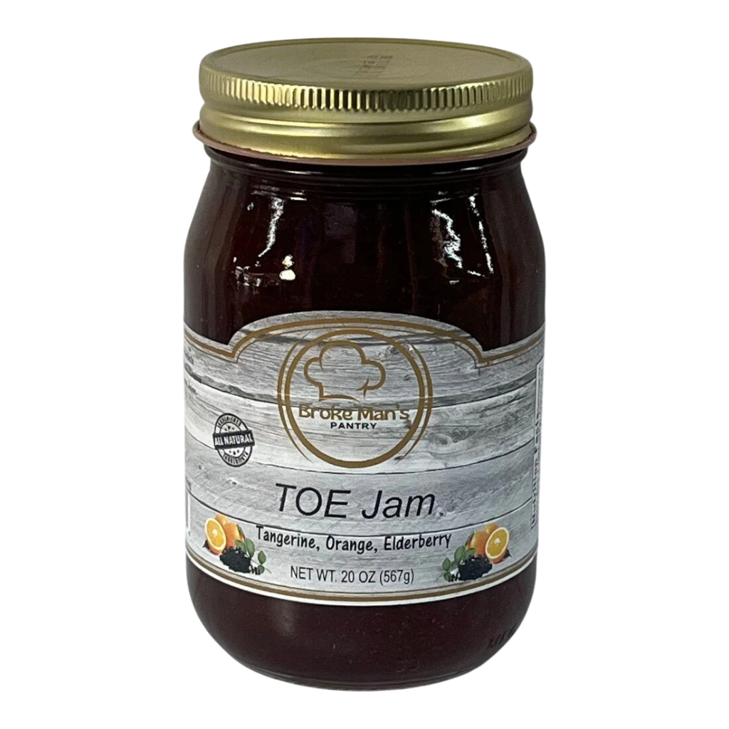 Broke Man's Pantry TOE Jam in a 20oz glass jar with a gold lid, featuring tangerine, orange, and elderberry flavors.