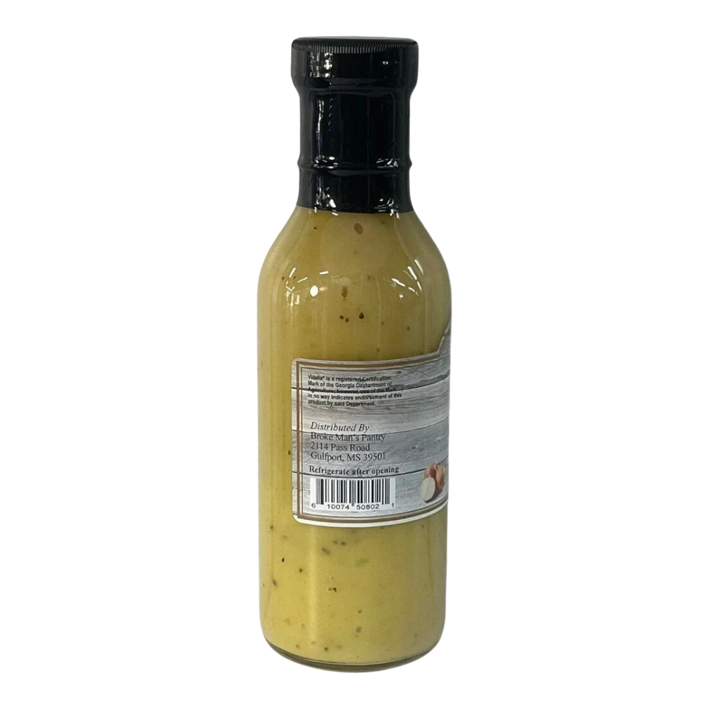 Broke Man's Pantry Vidalia Onion & Honey Mustard Dressing in a glass bottle with a black cap on a black background.