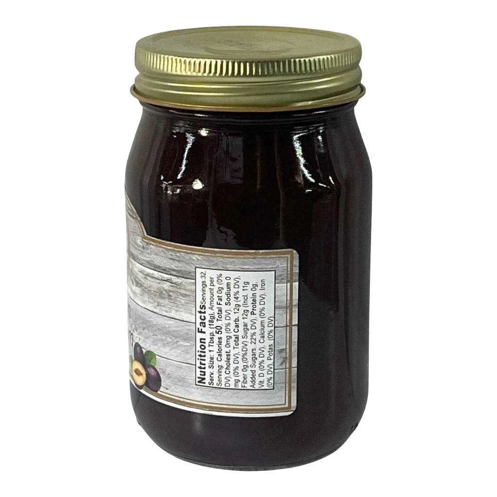 Broke Man's Pantry Damson Plum Jam in a glass jar with a gold lid, featuring a rustic label with nutrition facts.