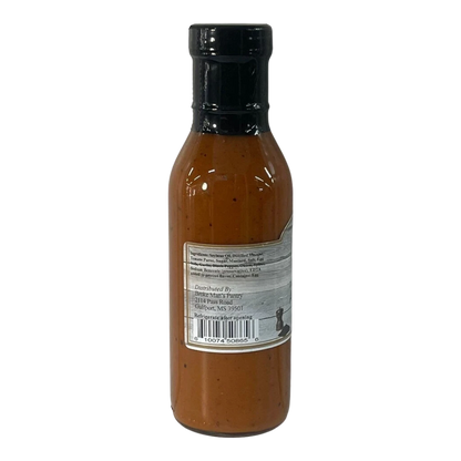 Broke Man's Pantry Awesome Sauce in a glass bottle with a black cap, featuring a label with ingredients and barcode.