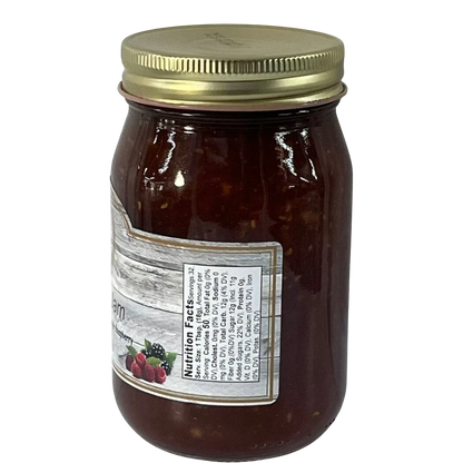 Broke Man's Pantry Gator Jam in a glass jar with a gold lid, featuring a blend of ginger, apple, and berry flavors.