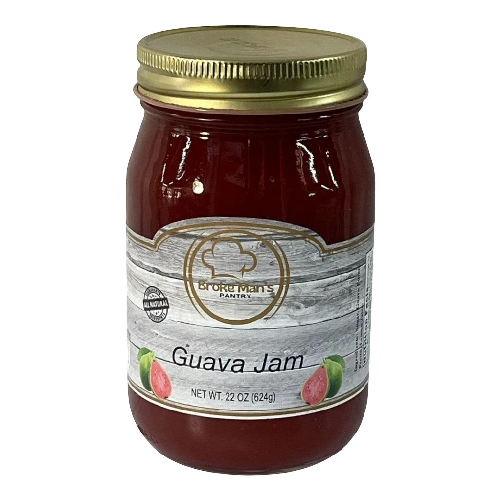 Broke Man's Pantry Guava Jam in a 22oz glass jar with a gold lid and rustic wood-grain label design.