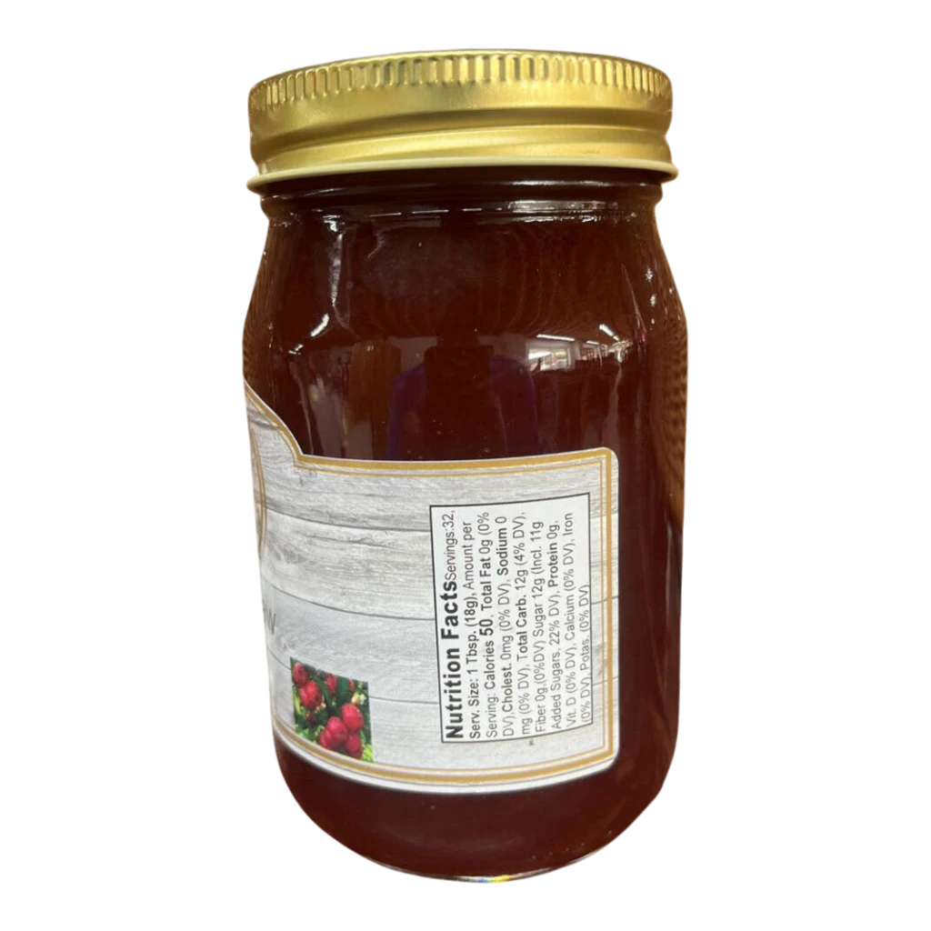 Broke Man's Pantry all-natural mayhaw jelly in a glass jar with a gold lid, featuring a nutrition facts label.