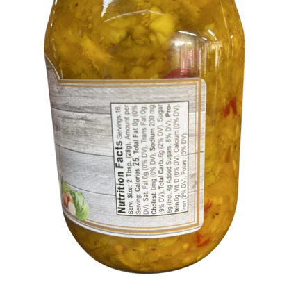 Broke Man's Pantry Mild Chow Chow relish in a glass jar showing the nutrition facts label and yellow vegetable mix.