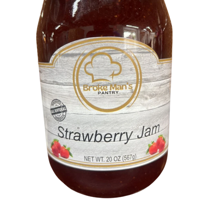 Broke Man's Pantry all-natural strawberry jam in a 20 oz glass jar with a rustic wood-grain label design.