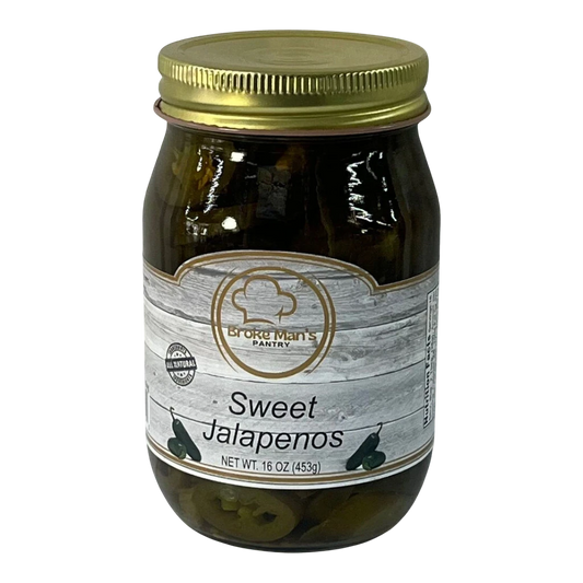 Broke Man's Pantry 16oz jar of all-natural sweet jalapeños with a gold lid and rustic wood-grain label.