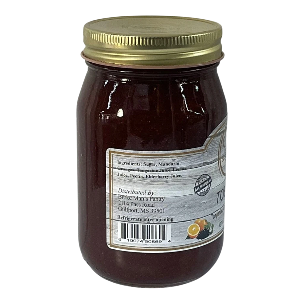 Broke Man's Pantry TOE Jam in a glass jar with a gold lid, featuring tangerine, orange, and elderberry ingredients.