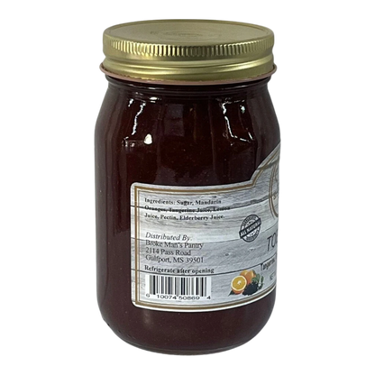 Broke Man's Pantry TOE Jam in a glass jar with a gold lid, featuring tangerine, orange, and elderberry ingredients.