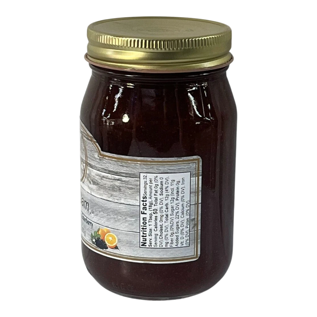 Broke Man's Pantry TOE Jam in a glass jar with a gold lid, featuring tangerine, orange, and elderberry flavors.