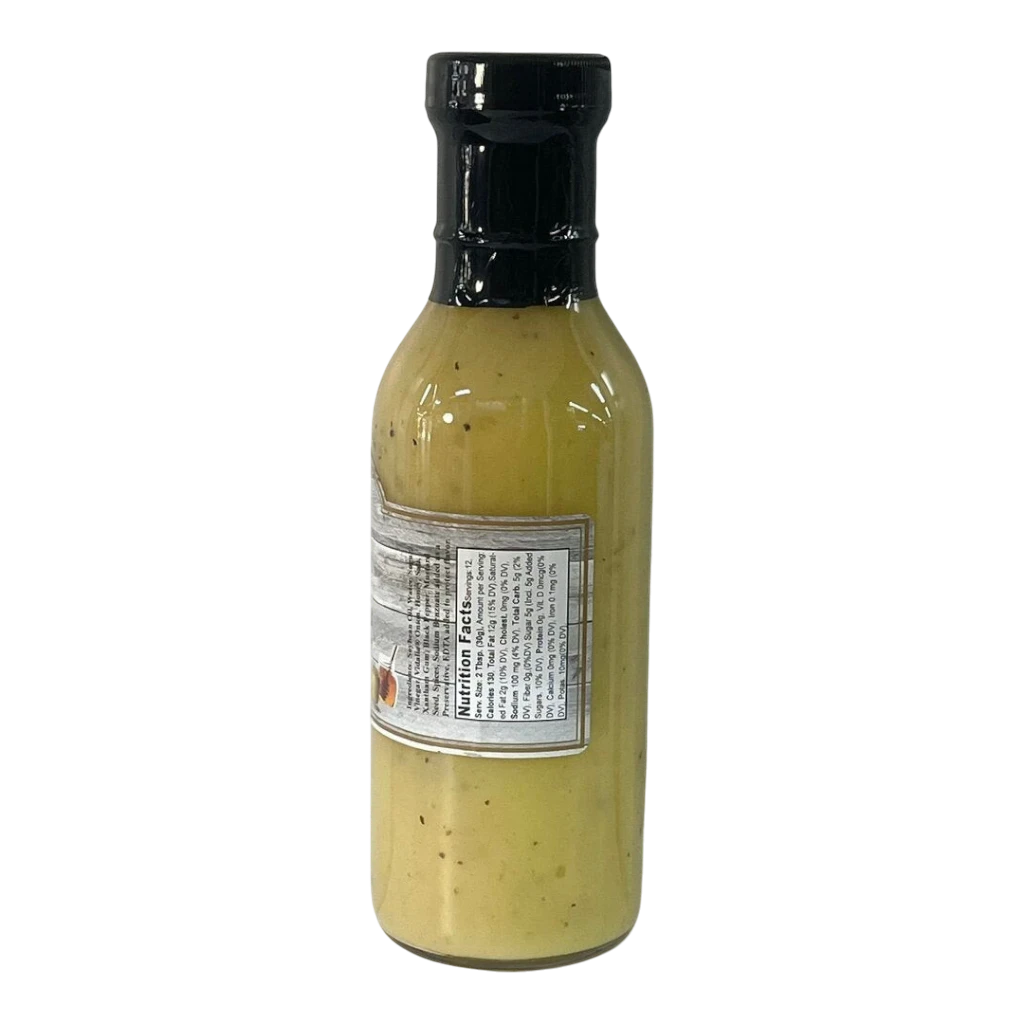 Broke Man's Pantry Vidalia Onion & Honey Mustard Dressing in a glass bottle with a black cap on a black background.