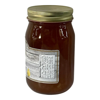 Broke Man's Pantry Cinnamon Pear Jam in a glass jar with a gold lid. The label features a pear illustration and nutrition facts.